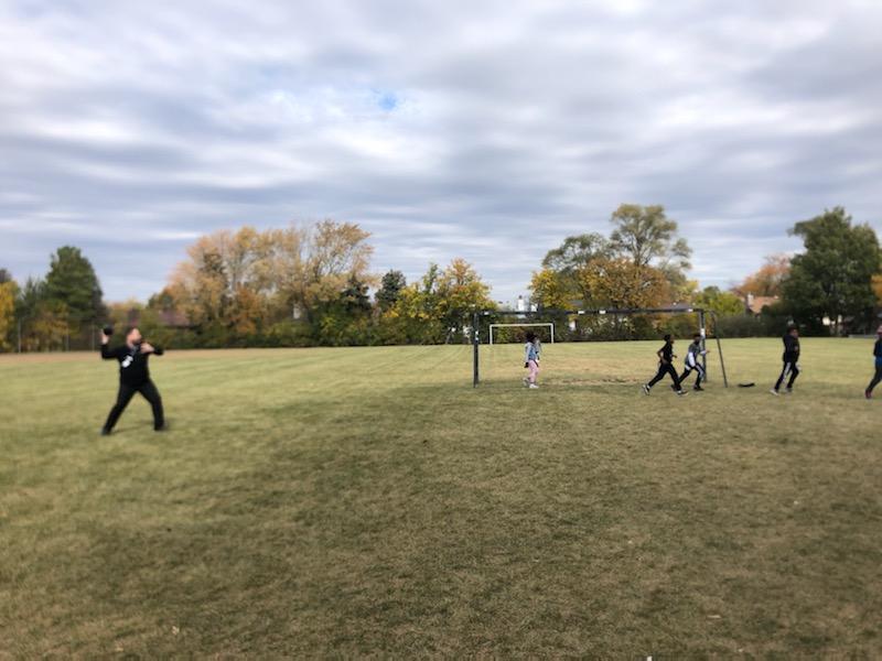 Eric throwing football